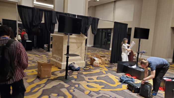 folding up the curtains and packing up vendor stuff