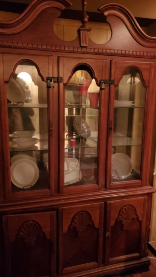 a fine china cabinet for joke paper plate supplies